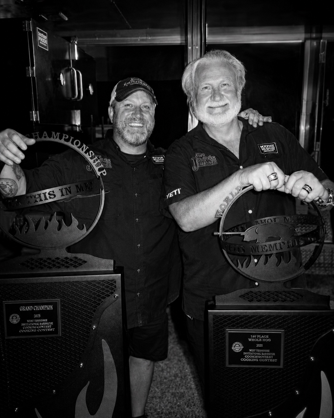 Southern Q pitmaster with Grand Champion and Whole Hog trophies at Memphis in May